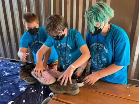 a group of people wearing masks