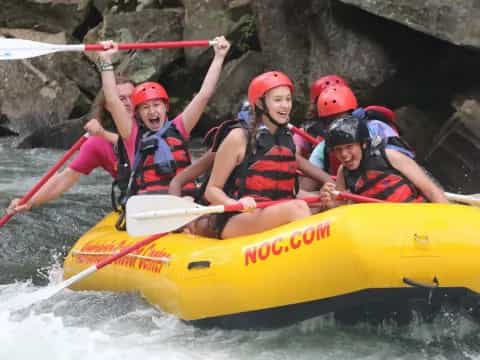a group of people in a raft