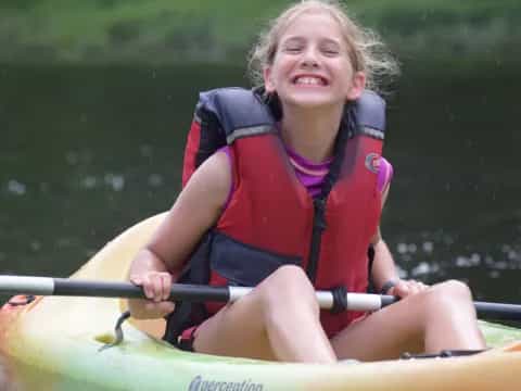 a girl in a kayak
