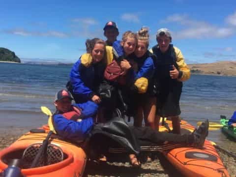 a group of people on a raft