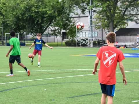 a group of people play football