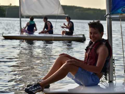 a woman sitting on a boat