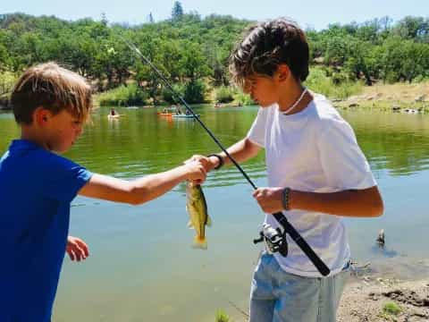 a man and a boy fishing