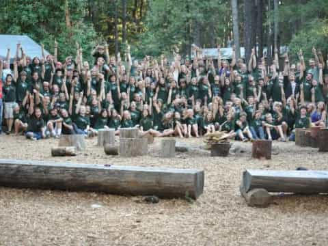 a large group of people posing for a photo