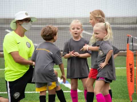 a group of girls in a field