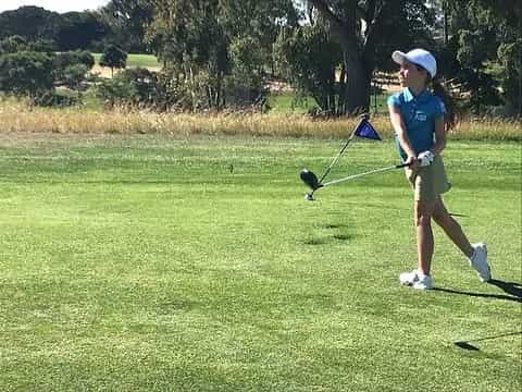 a person playing golf