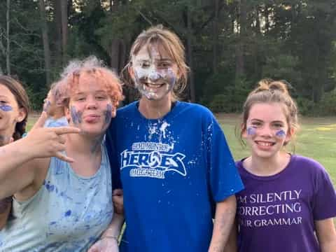 a group of people with face paint