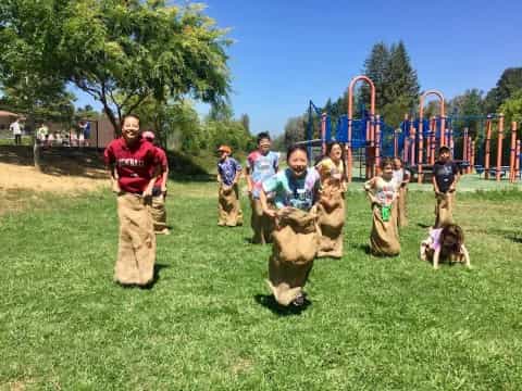 a group of people with a cow