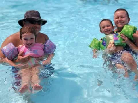a group of children in the water