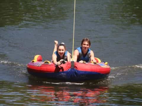 a couple of people in a canoe