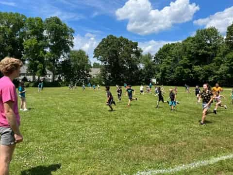 a group of people playing football