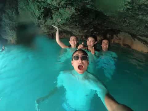 a group of people in a pool