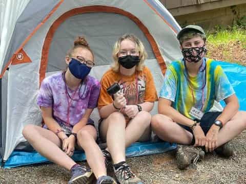 a group of people wearing masks