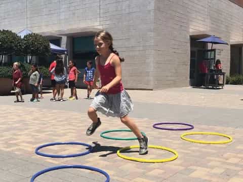 a girl jumping in the air