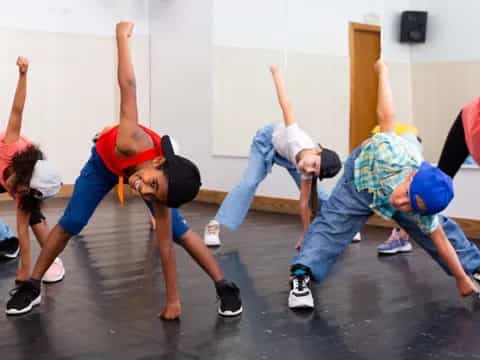 a group of people doing yoga