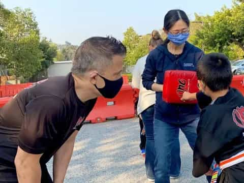 a group of people wearing masks