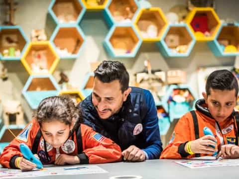 a person and two boys