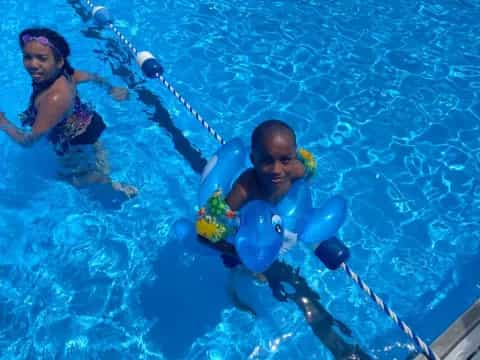 a man and woman in a pool