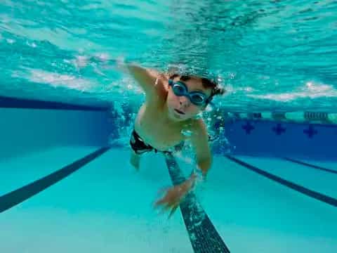 a person in a swimsuit in a pool