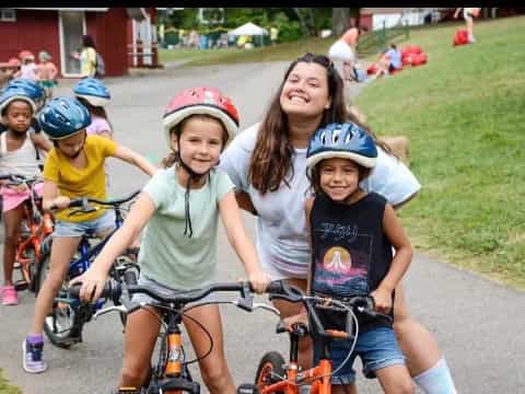 a group of children on bicycles
