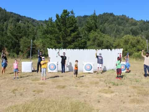 a group of people holding signs