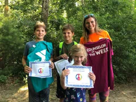 a group of people holding signs