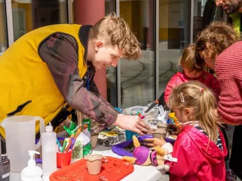 a person and a group of children