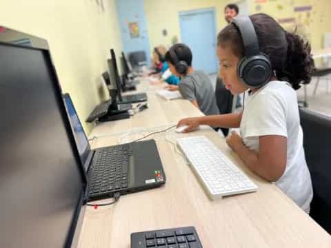 a few people working on computers