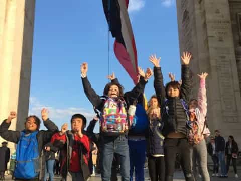 a group of people holding flags