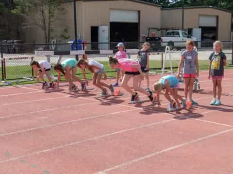 a group of people on a track