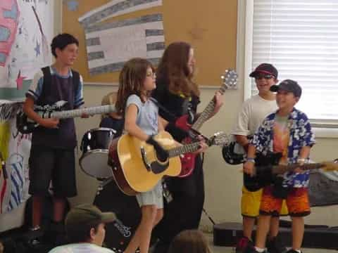 a group of people playing instruments