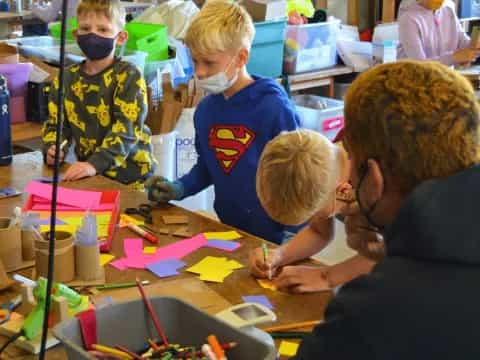 a group of people painting