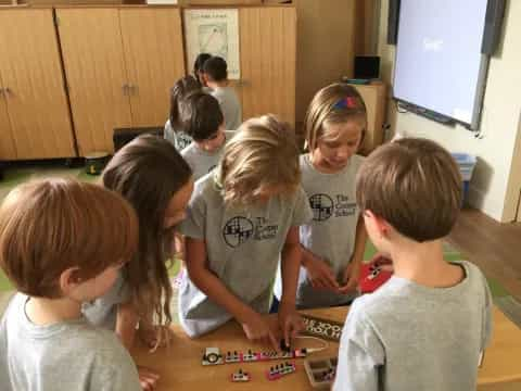 a group of children playing with toys