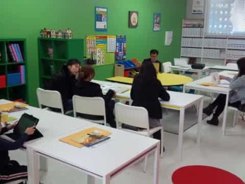 a group of people sitting at tables