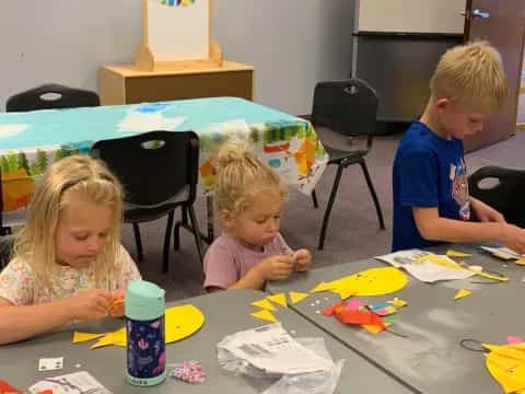 children sitting at a table