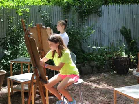 a group of people sitting outside