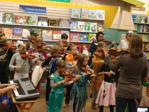 a group of children in a library