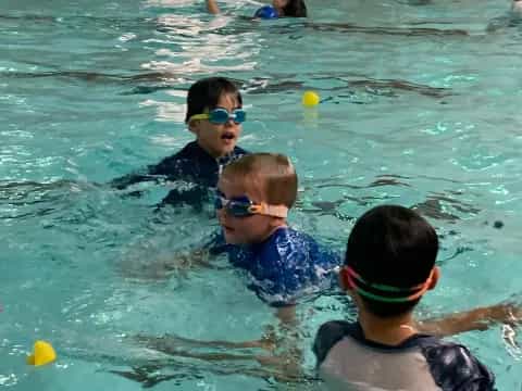 a group of people in a pool