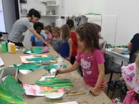 a group of people painting