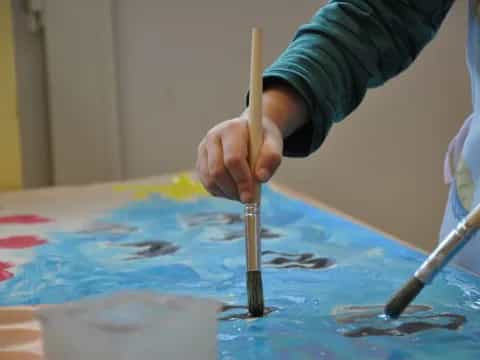 a person painting a picture