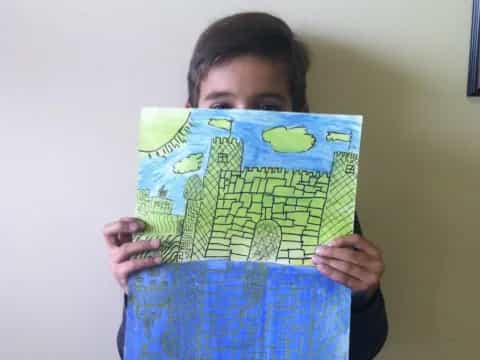 a child holding a book