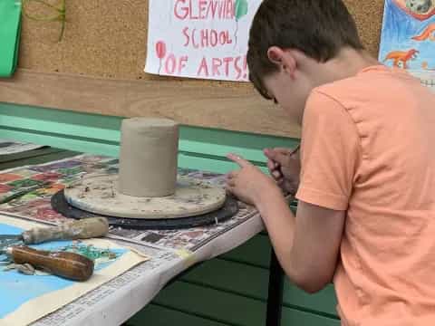 a man painting a picture