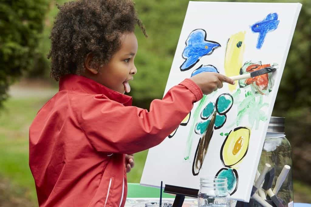 a child painting a picture