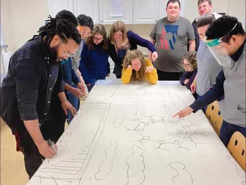 a group of people around a table