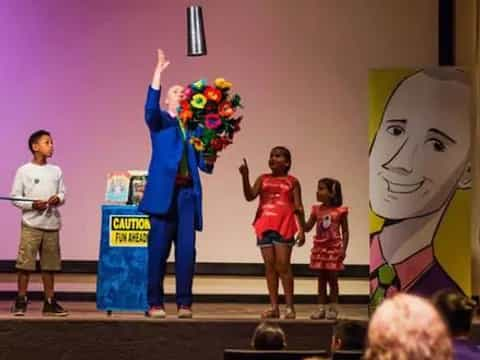 a group of children on a stage