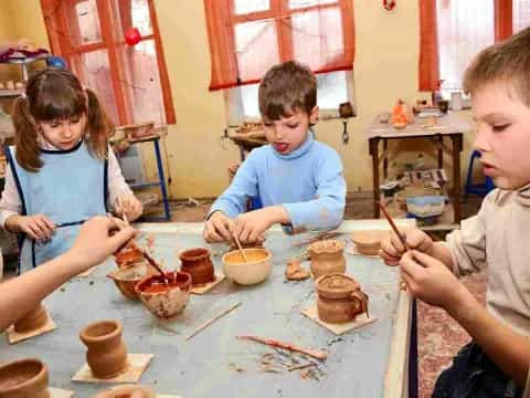 a group of children painting