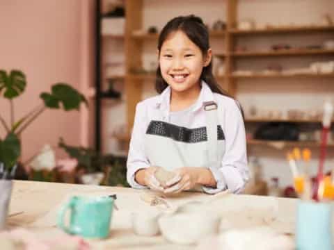 a woman in a white coat