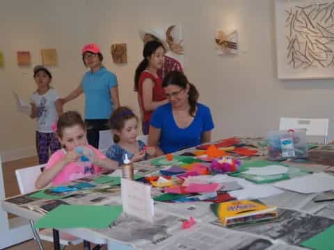 a group of people around a table