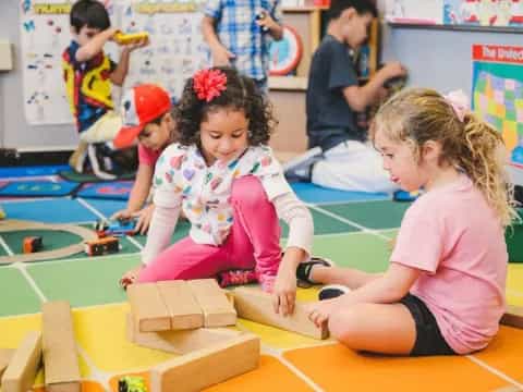 a few children playing with toys