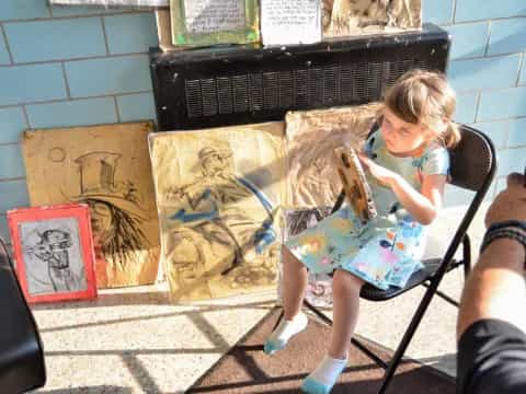 a child sitting in a chair